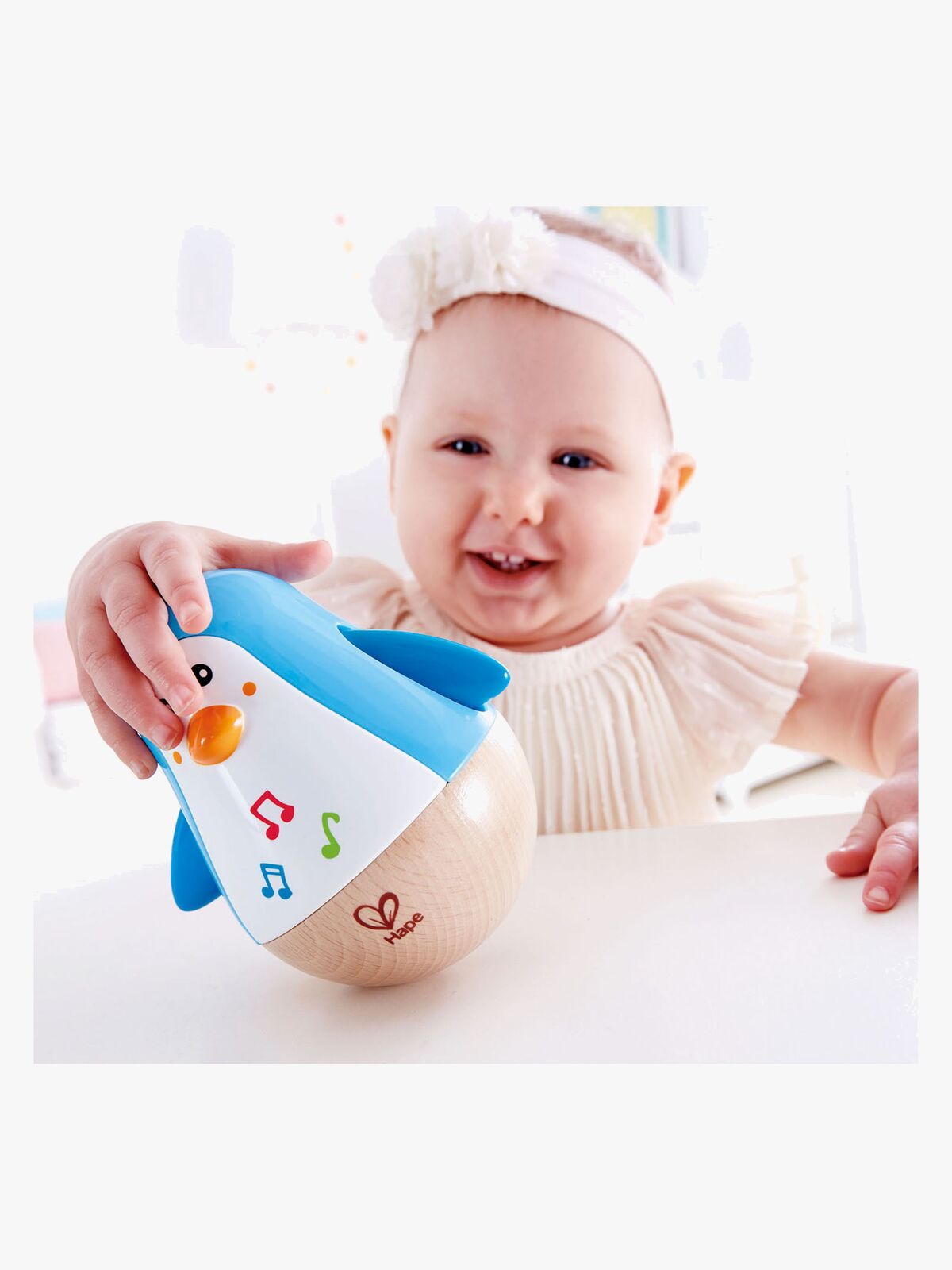 Hape Penguin Musical Wobbler Holzspielzeug